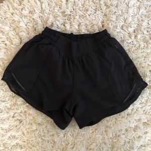 Womens black Lululemon shorts, size 4